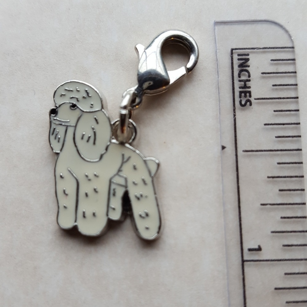 Poodle white enamel  charm with lobster claw clip.